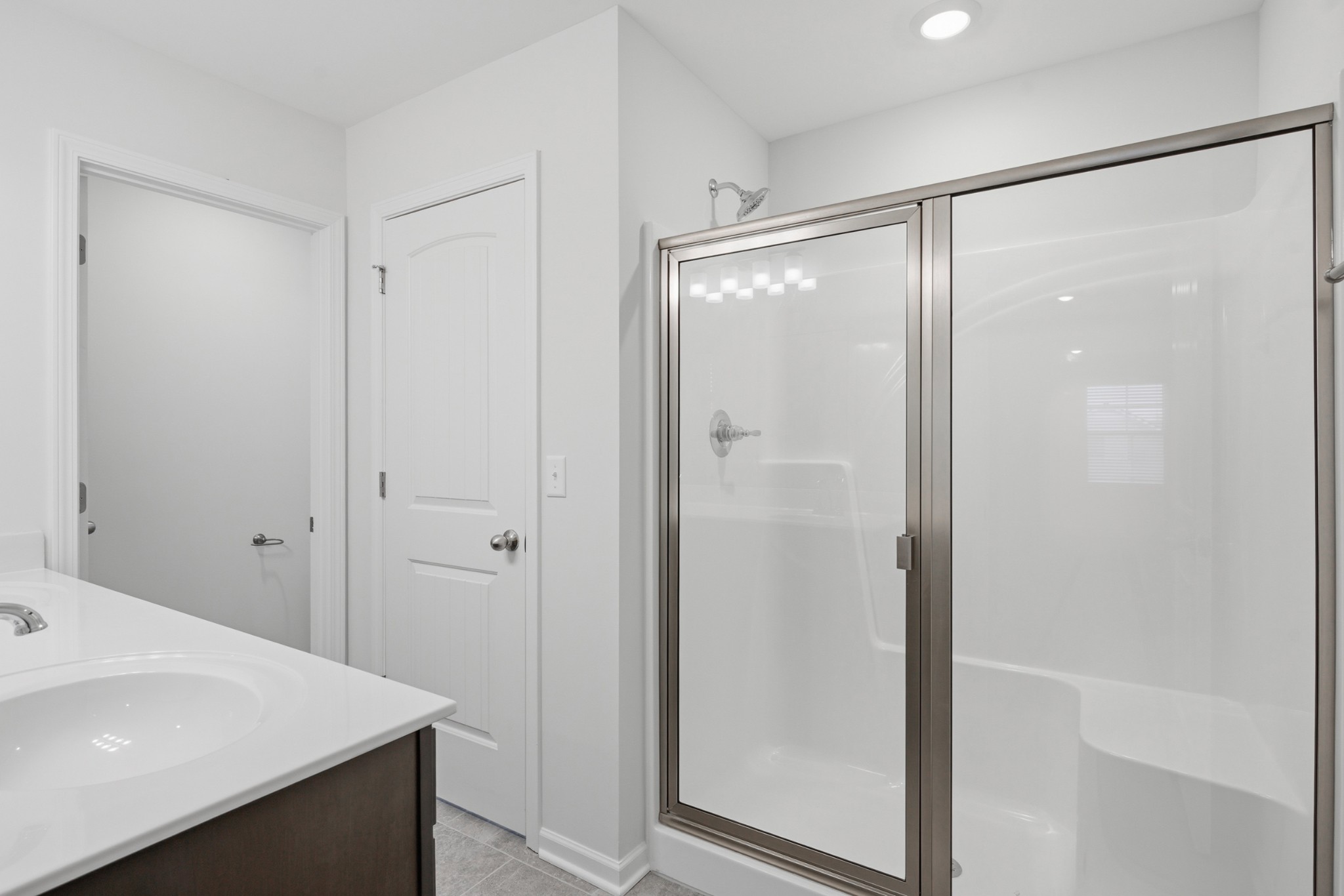 4015 Colleton Lane Murfreesboro, TN 37153 - Photo 18 of 34 a bathroom with a shower and a sink