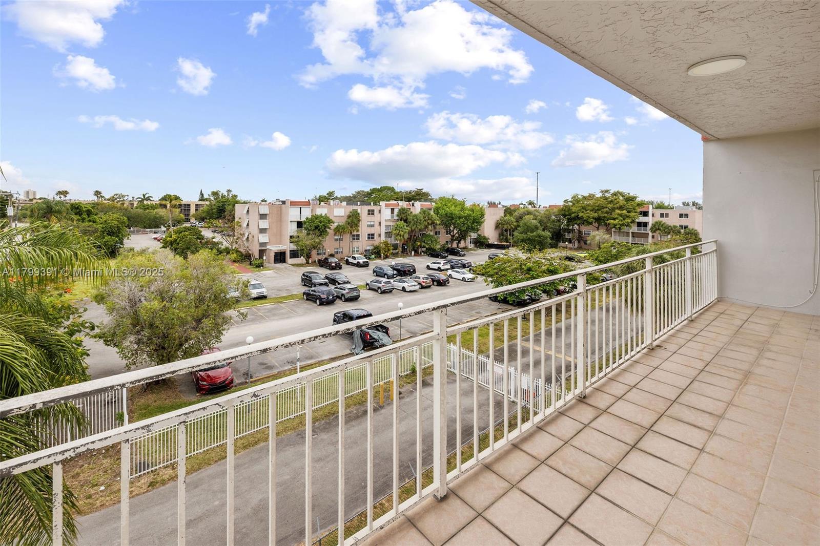 8401 Northwest 8th Street, Unit 401 Miami, FL 33126 - Photo 18 of 35 a view of balcony with furniture