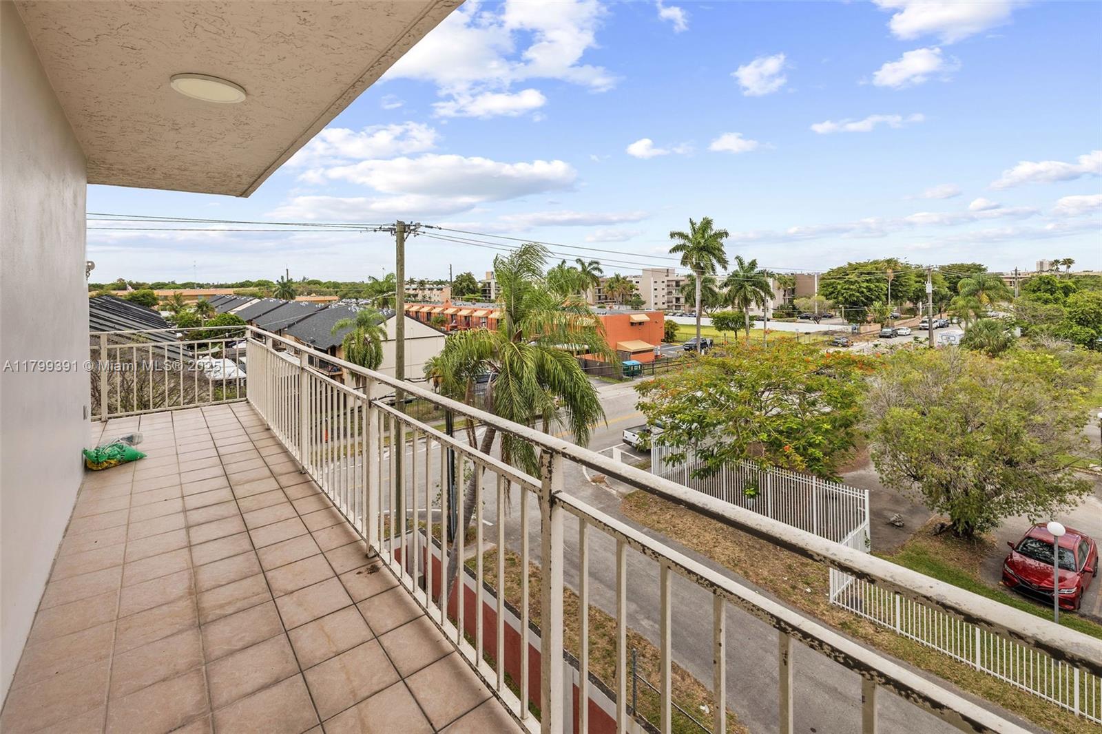 8401 Northwest 8th Street, Unit 401 Miami, FL 33126 - Photo 19 of 35 a view of a balcony with city view