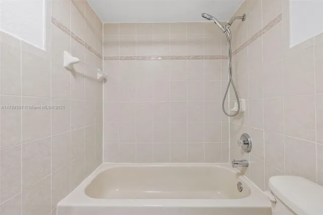 a bathroom with a sink vanity and a mirror