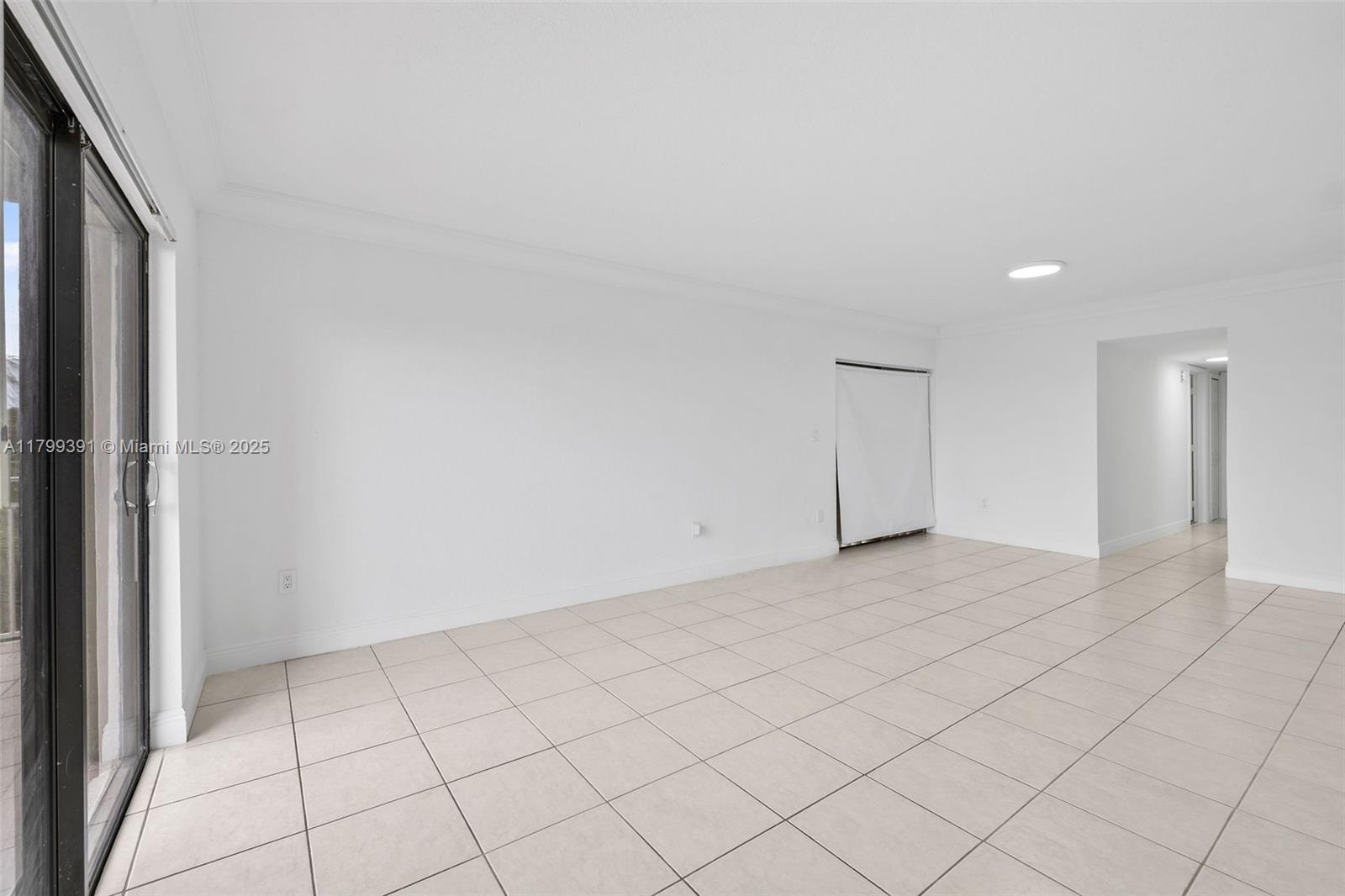 8401 Northwest 8th Street, Unit 401 Miami, FL 33126 - Photo 10 of 35 a view of an empty room