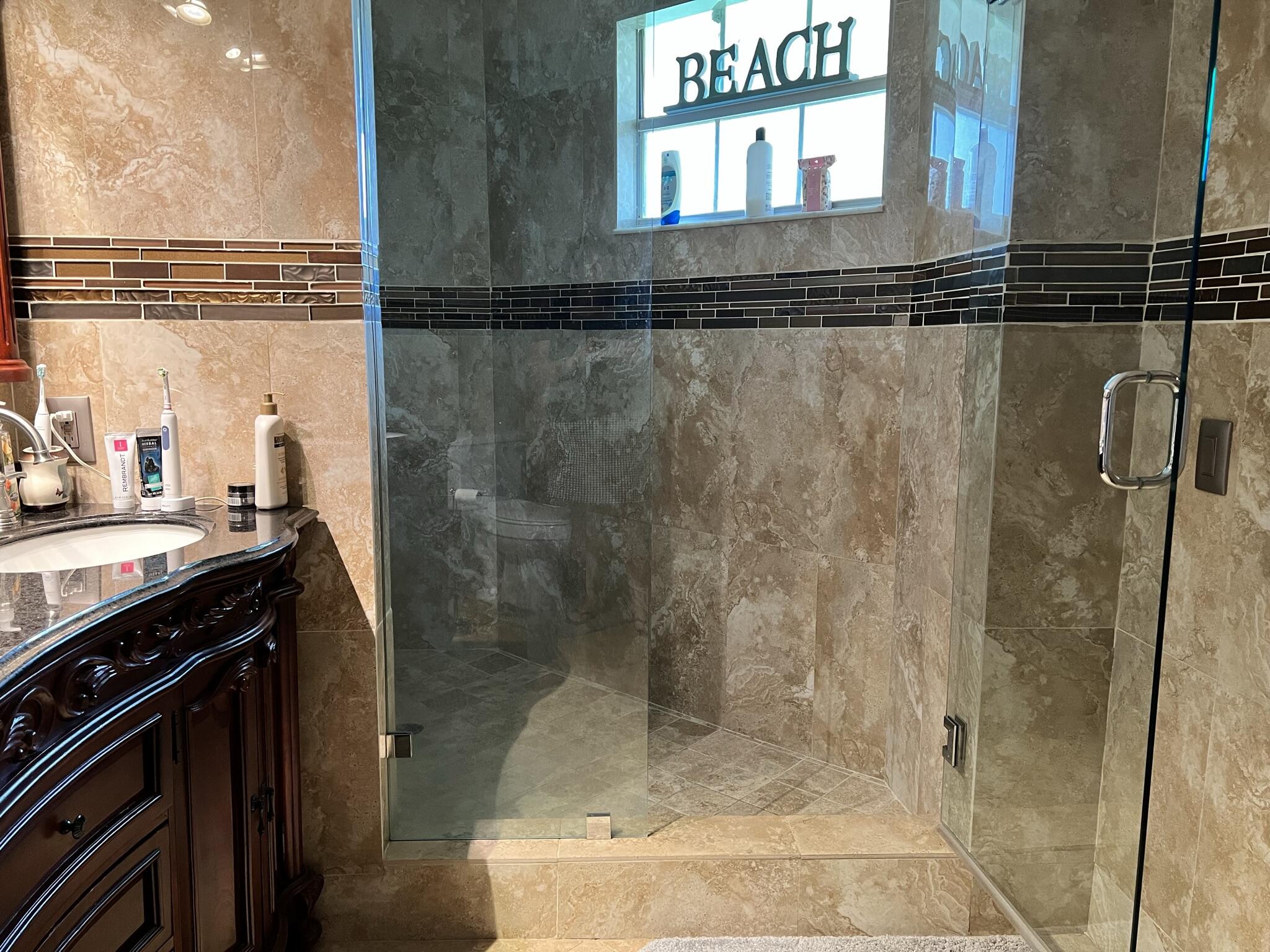 6549 Via Regina Boca Raton, FL 33433 - Photo 7 of 13 Primary Bathroom Shower