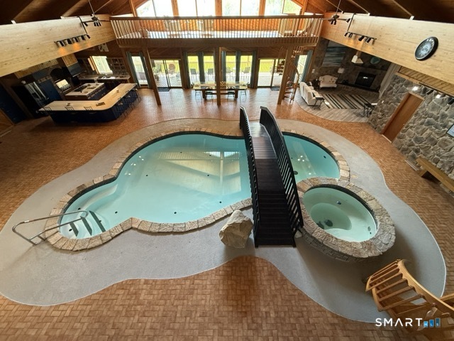 7 Riverview Street Enfield, CT 06082 - Photo 26 of 29 an aerial view of a house with swimming pool and patio