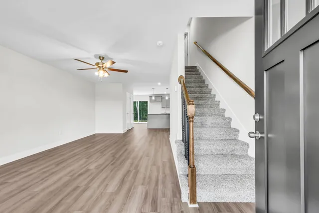 a view of entryway with wooden floor