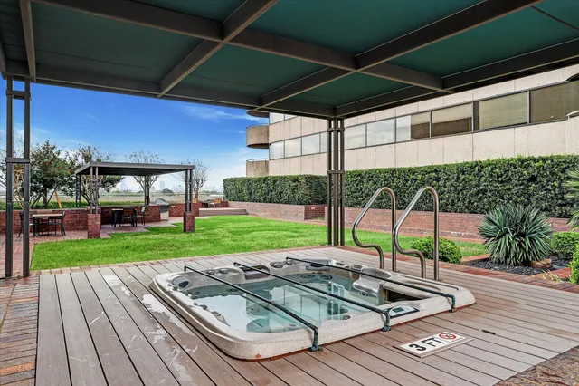 a view of a backyard with sitting area