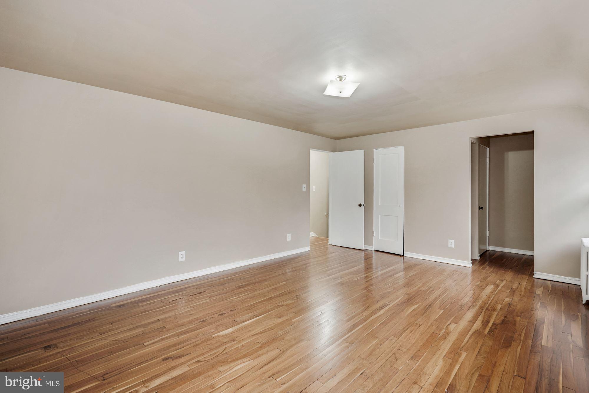 3209 19th Road North Arlington, VA 22201 - Photo 16 of 35 a view of an empty room with wooden floor
