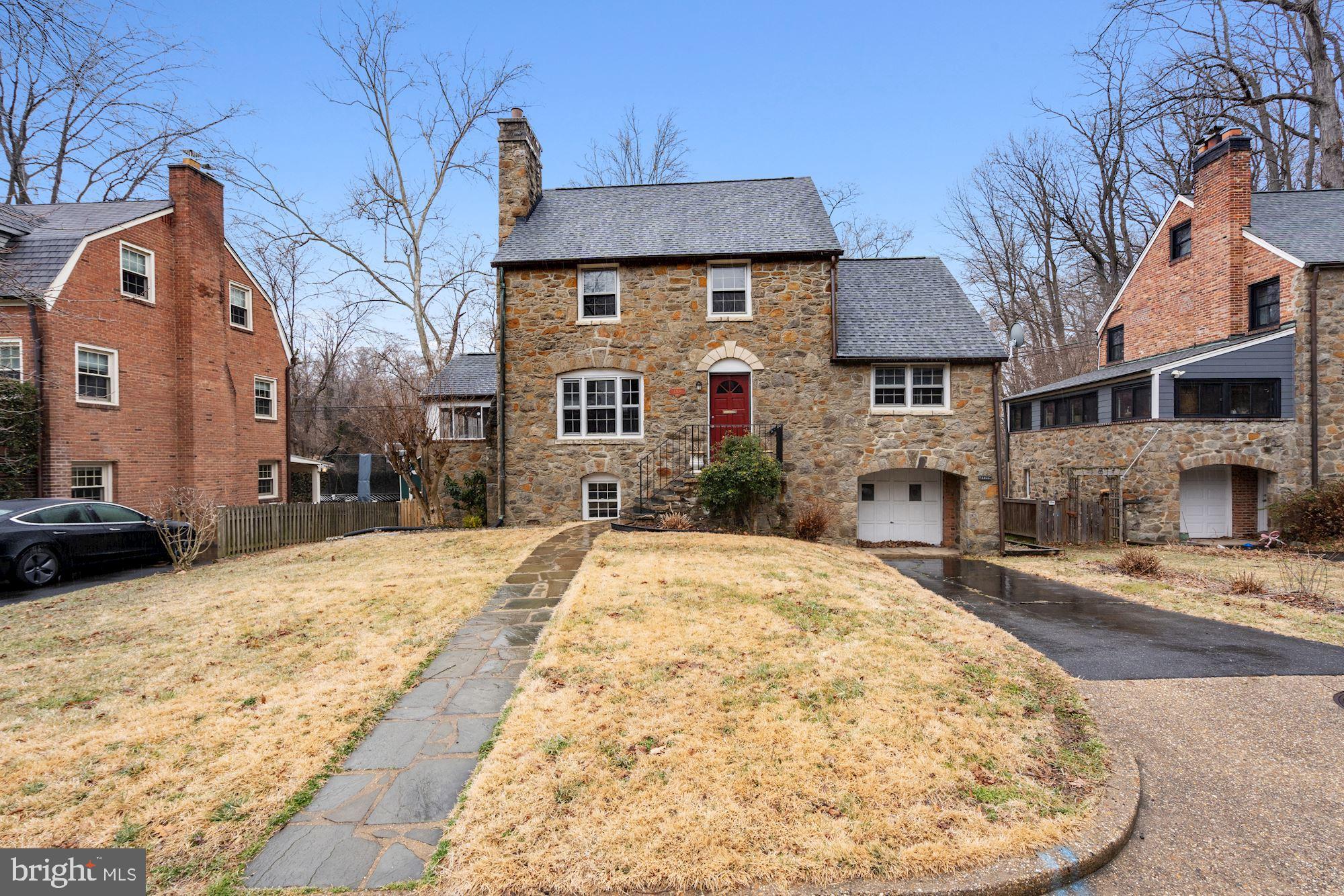 3209 19th Road North Arlington, VA 22201 - Photo 2 of 35 a view of a house with snow on the road