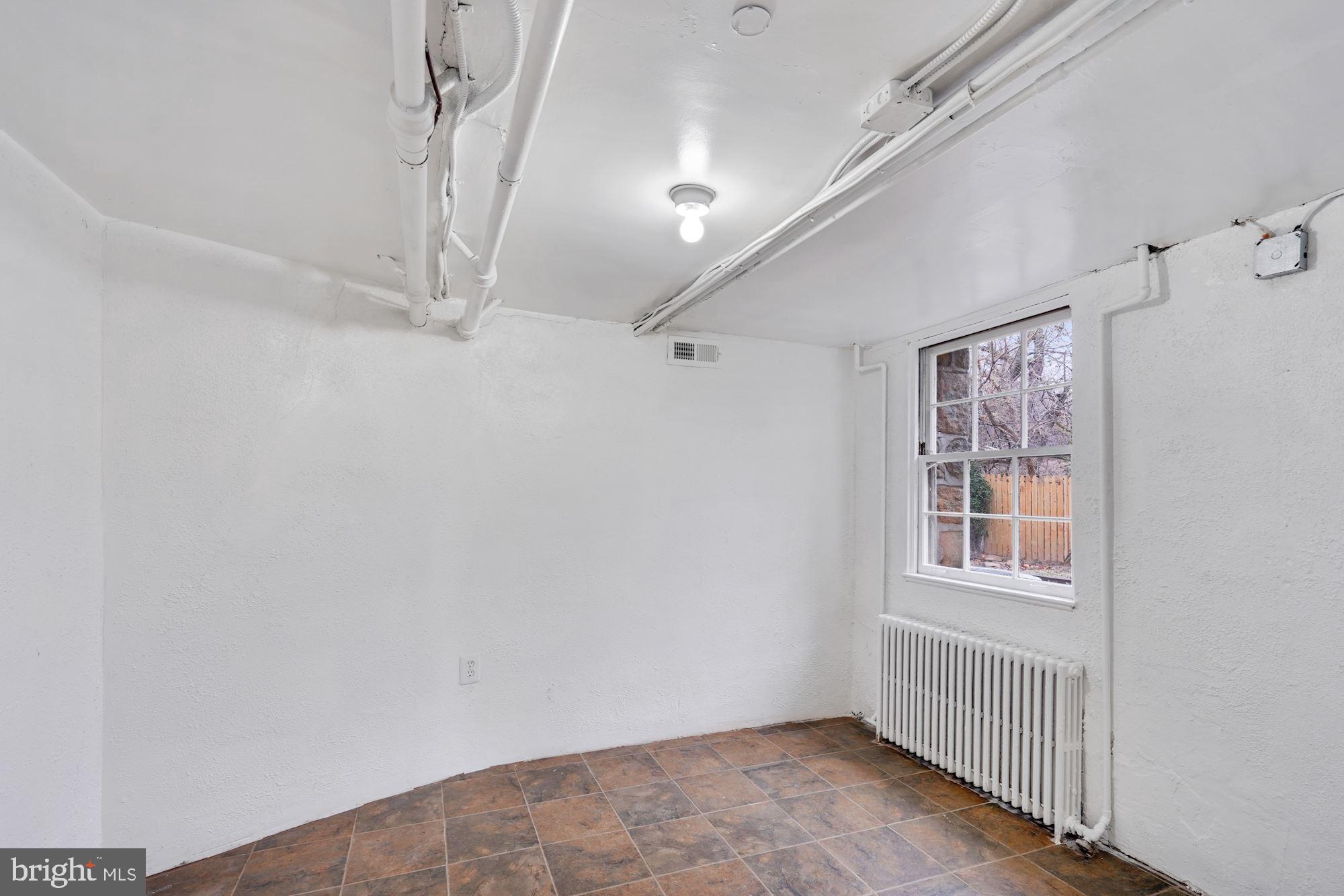 3209 19th Road North Arlington, VA 22201 - Photo 27 of 35 a view of an empty room with a window