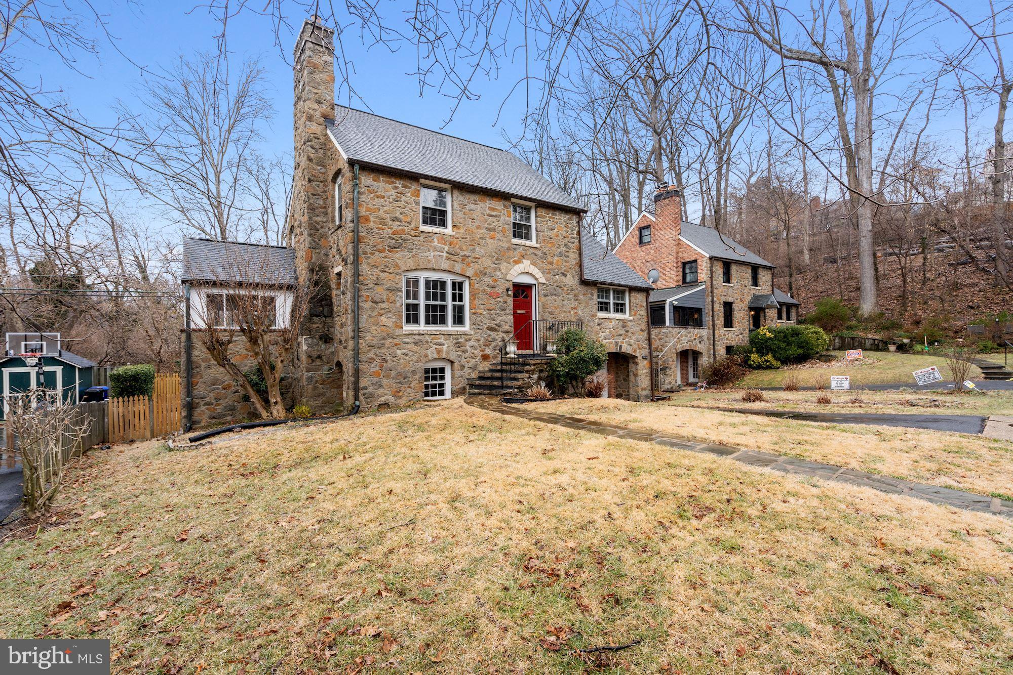 3209 19th Road North Arlington, VA 22201 - Photo 3 of 35 a view of a house with snow on the road