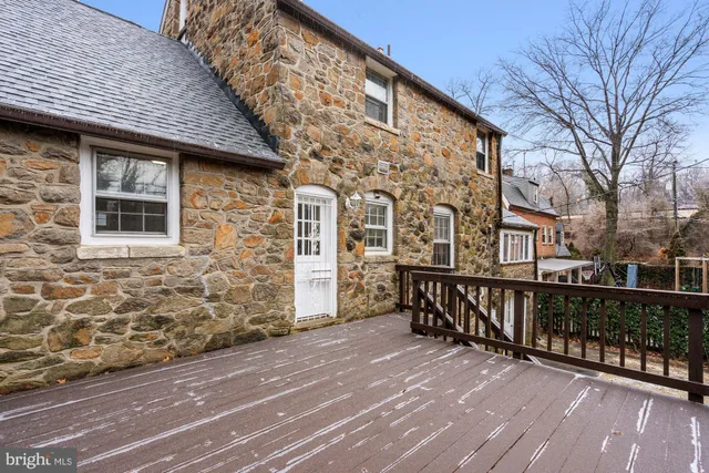 a view of a wooden roof deck
