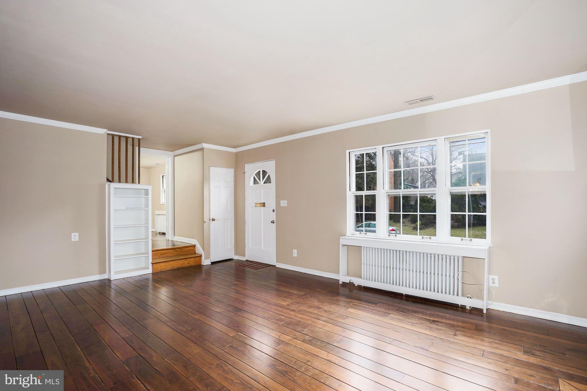 3209 19th Road North Arlington, VA 22201 - Photo 6 of 35 wooden floor in an empty room with a window and wooden floor