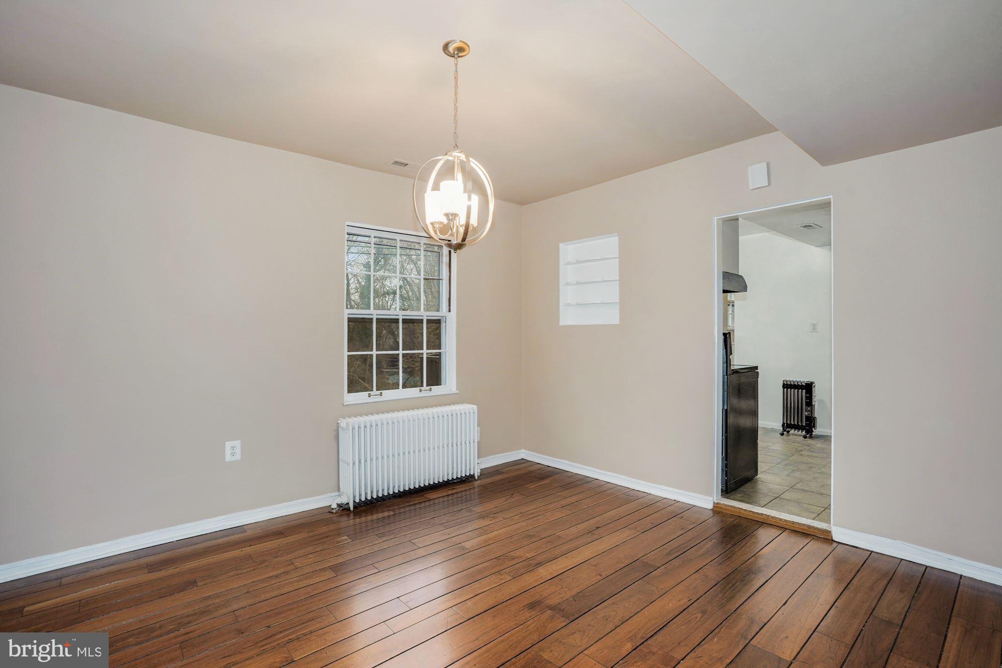 3209 19th Road North Arlington, VA 22201 - Photo 8 of 35 a view of empty room with wooden floor and window