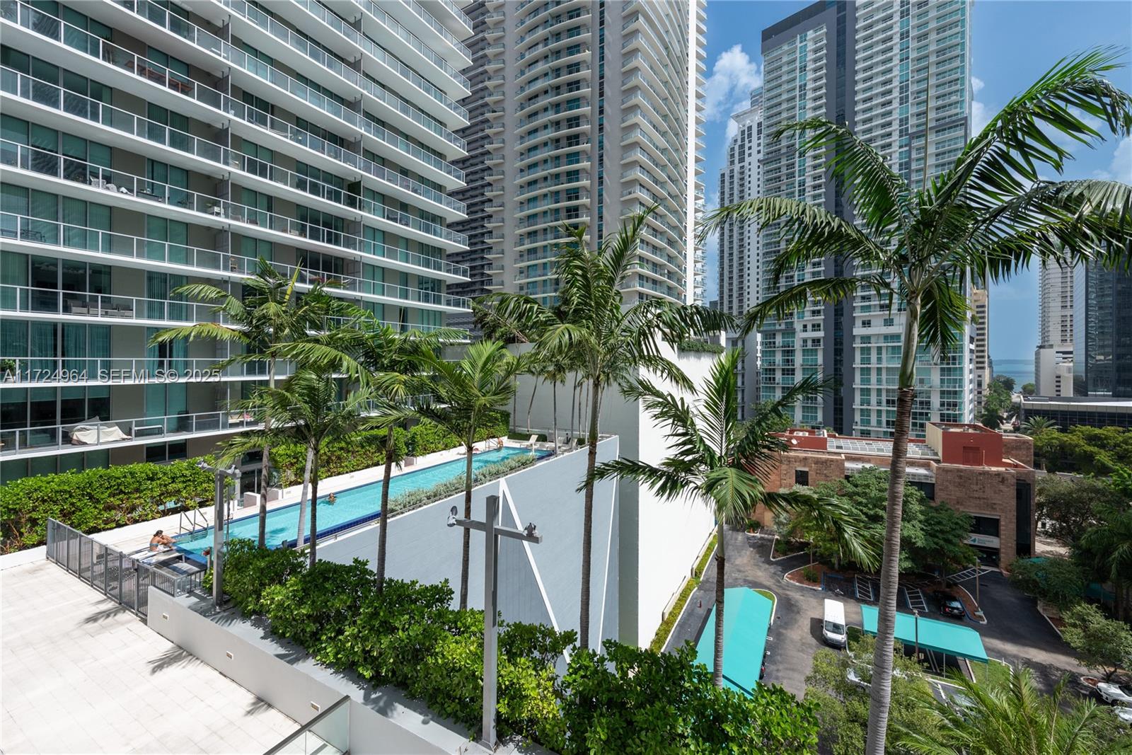 79 Southwest 12th Street, Unit 1107S Miami, FL 33130 - Photo 15 of 26 a view of a palm trees front of house