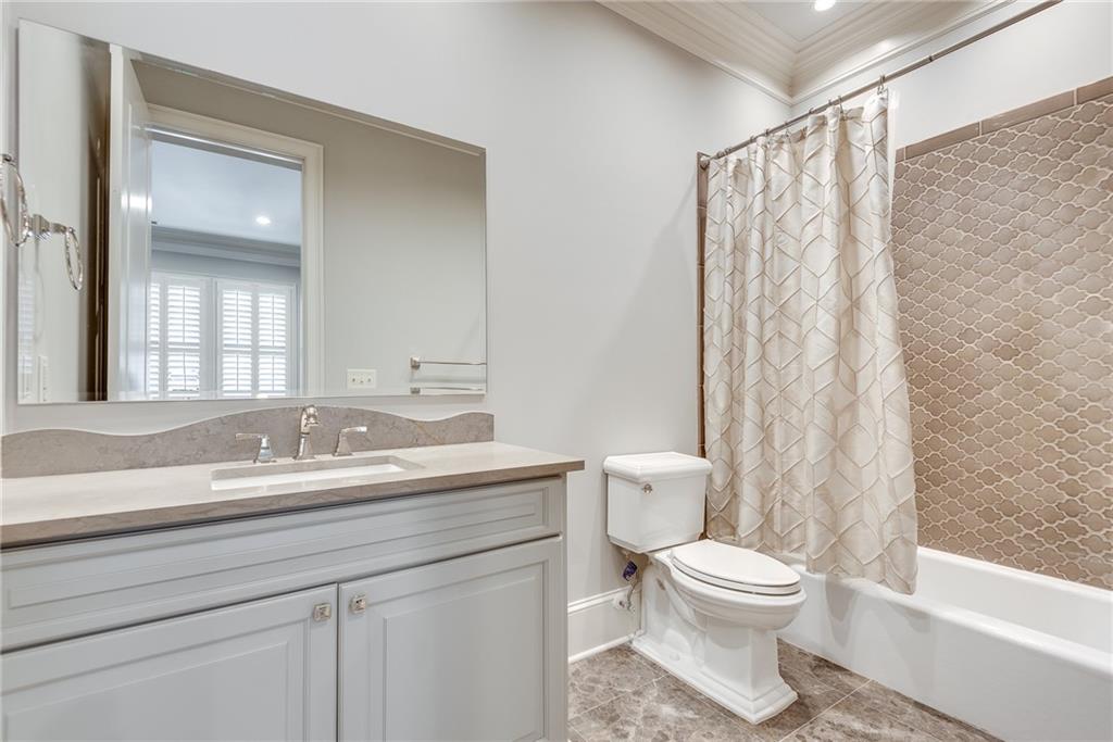 187 Fontaine Road Southwest Mableton, GA 30126 - Photo 67 of 84 a bathroom with a sink a toilet and a mirror
