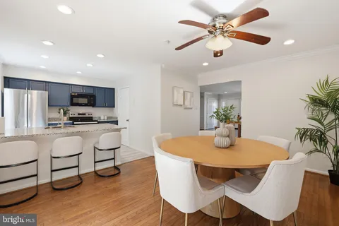 a view of a chairs and table on the wooden floor