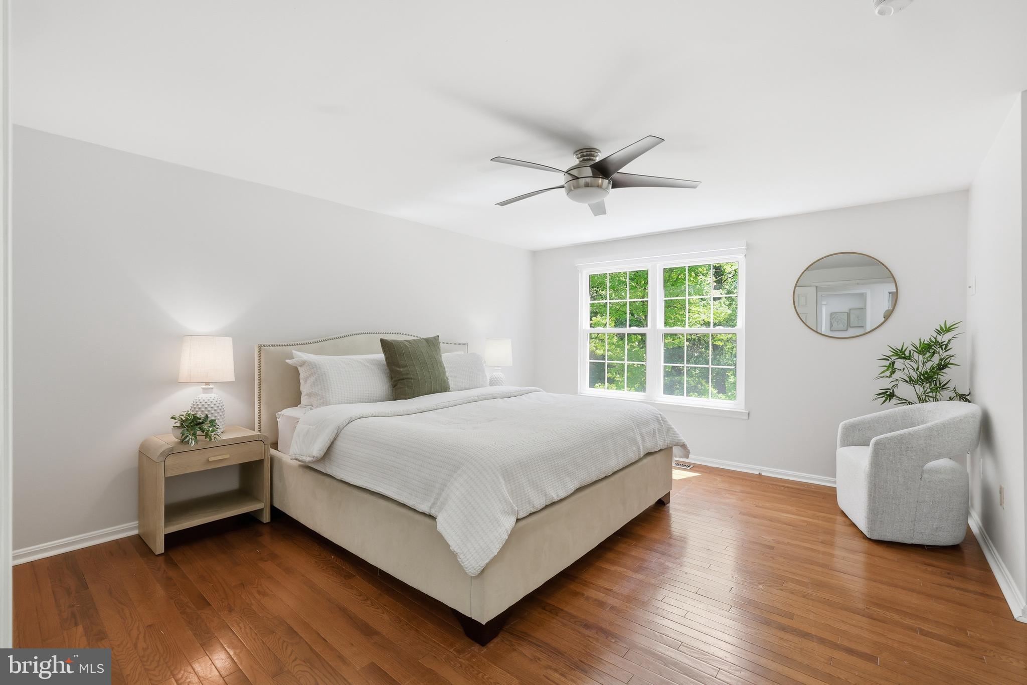 15029 Shamrock Ridge Road Silver Spring, MD 20906 - Photo 21 of 44 a bedroom with a bed and window