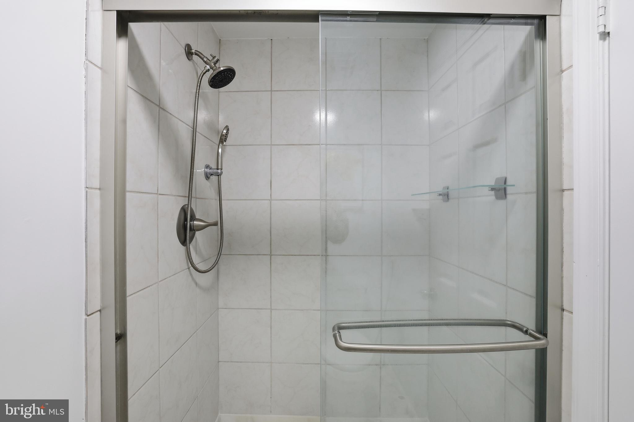 15029 Shamrock Ridge Road Silver Spring, MD 20906 - Photo 26 of 44 a bathroom with a shower