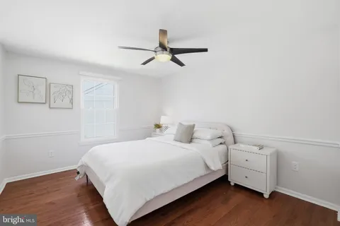 a bedroom with a bed and a closet