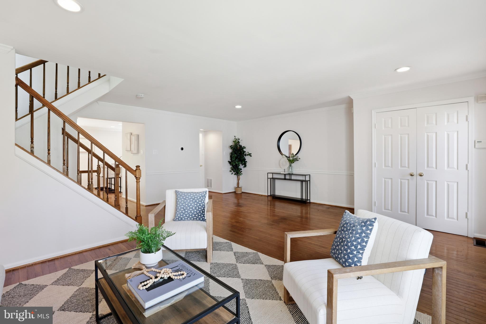 15029 Shamrock Ridge Road Silver Spring, MD 20906 - Photo 6 of 44 a living room with furniture and a table