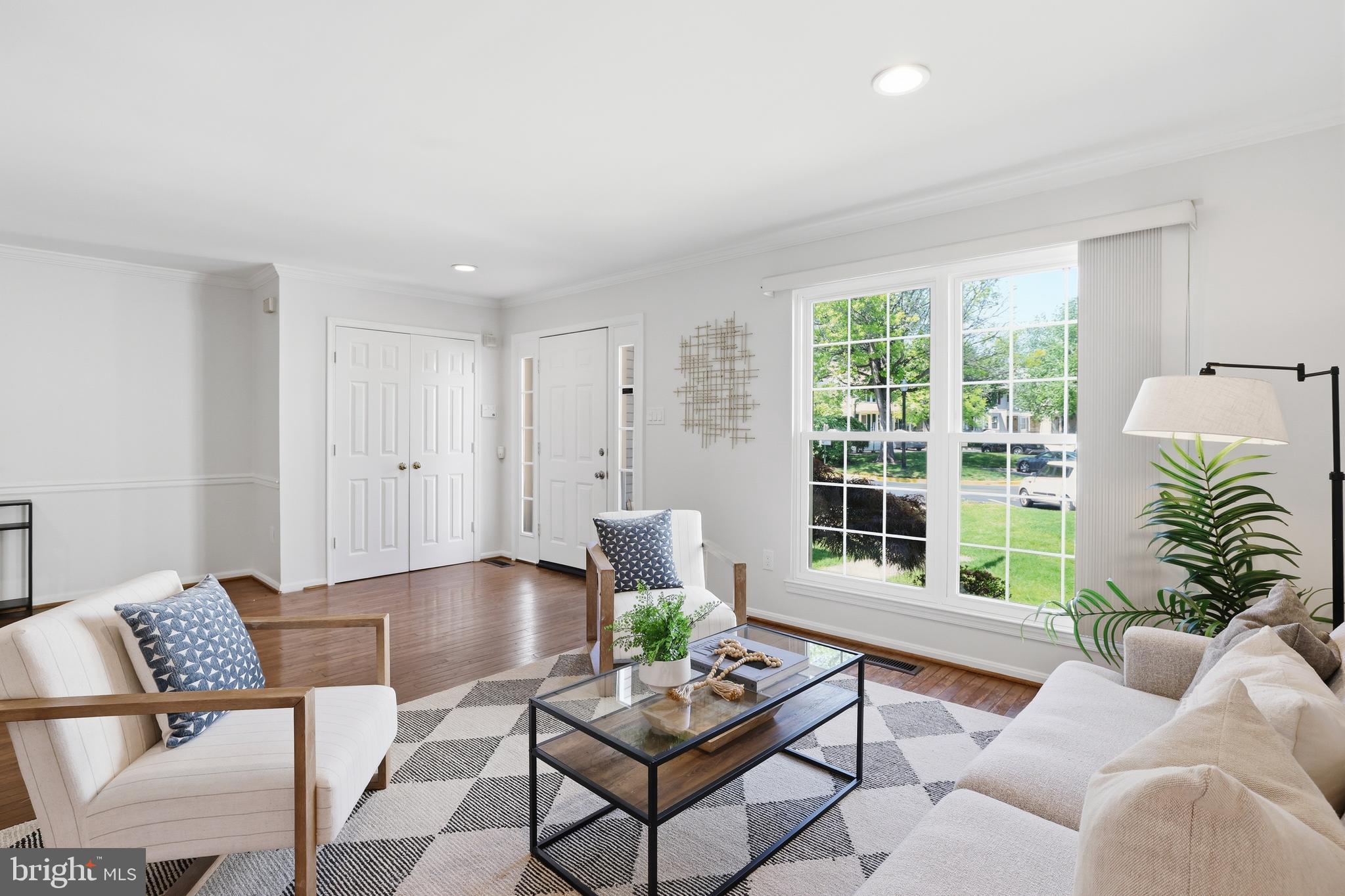 15029 Shamrock Ridge Road Silver Spring, MD 20906 - Photo 7 of 44 a living room with furniture and a large window