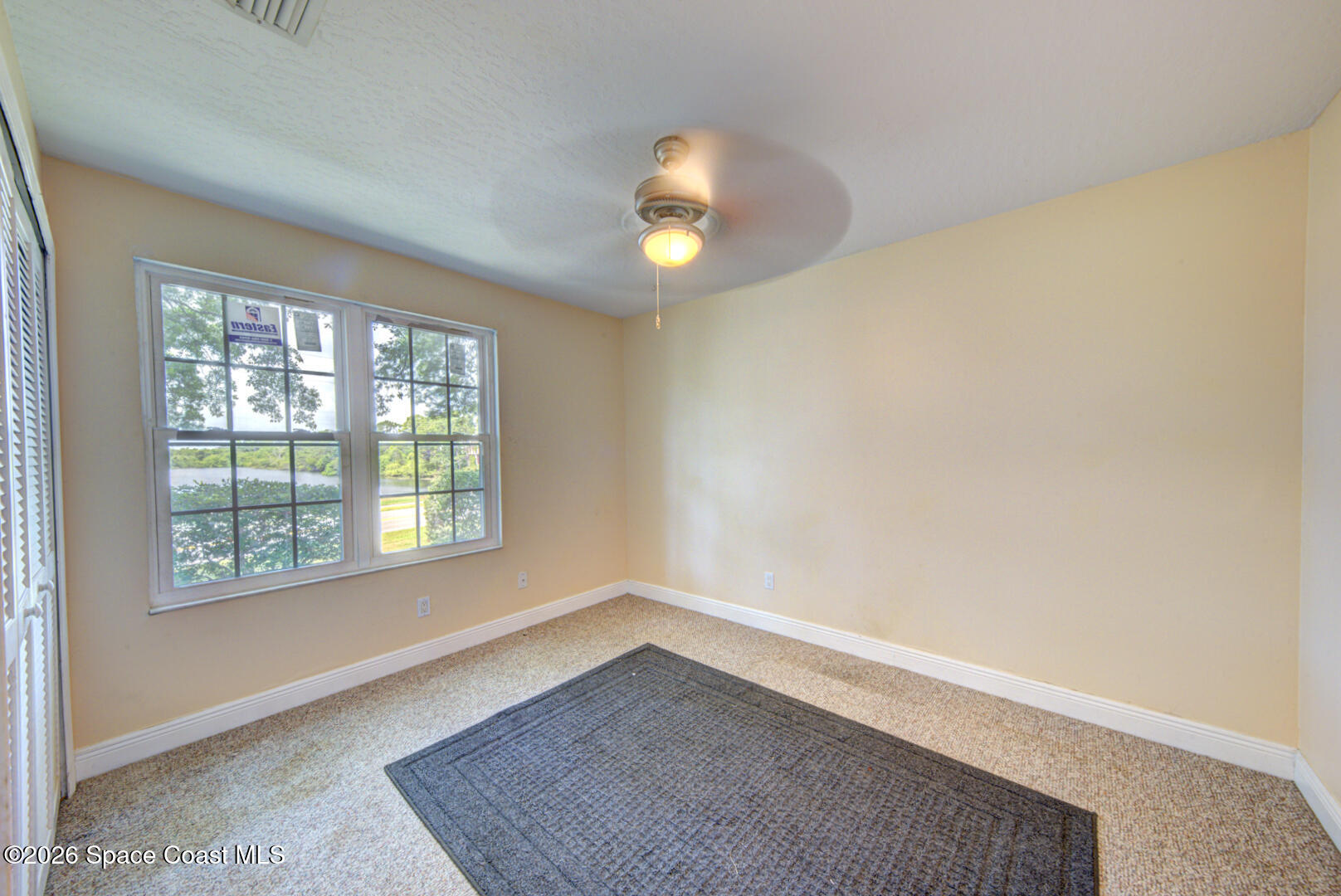7667 North Wickham Road, Unit 1416 Melbourne, FL 32940 - Photo 19 of 41 bedroom 3 view from door