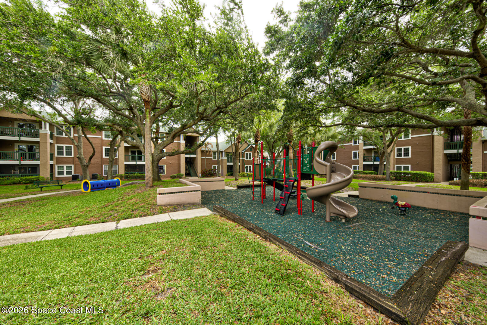 7667 North Wickham Road, Unit 1416 Melbourne, FL 32940 - Photo 32 of 41 playground behind building 1400