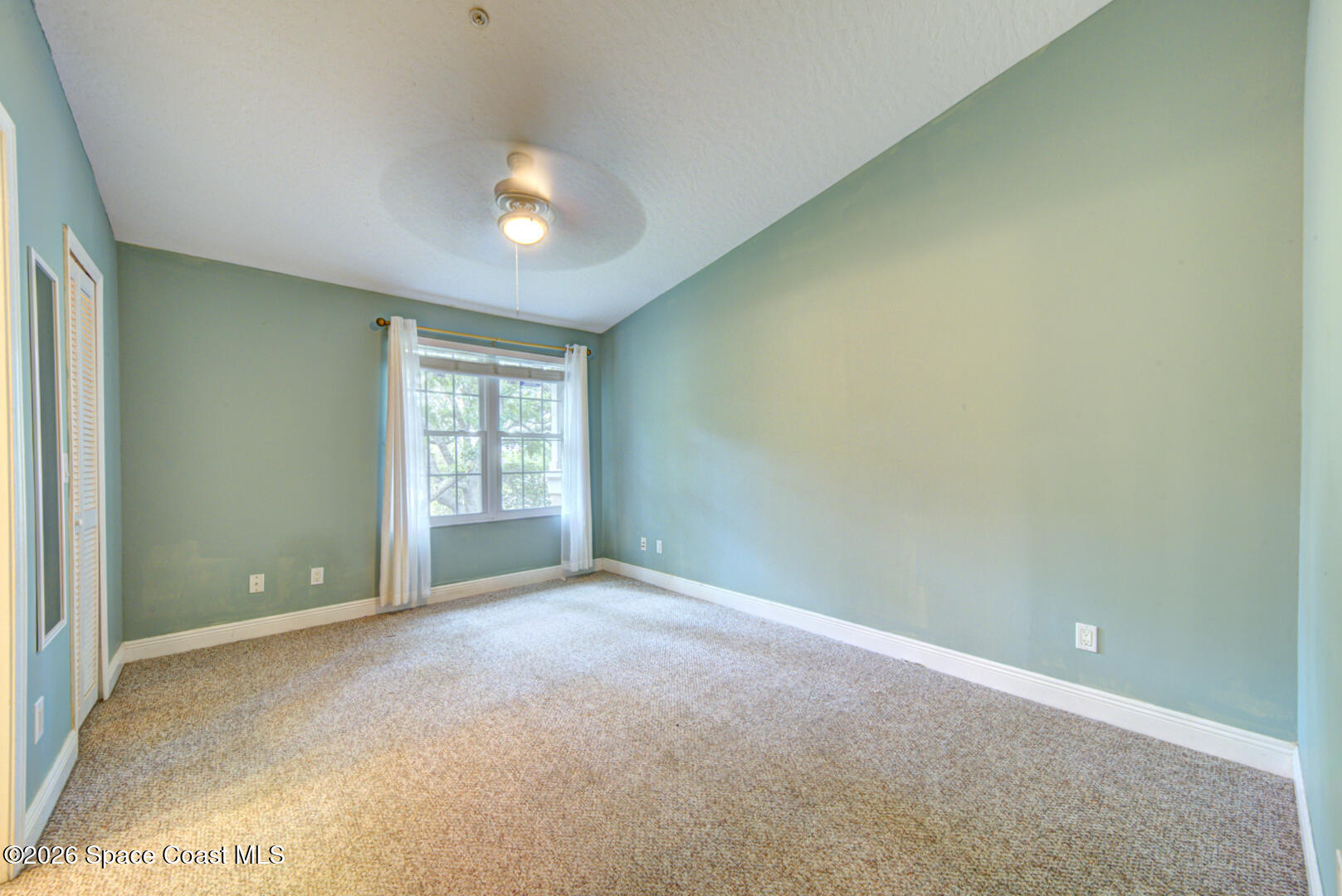 7667 North Wickham Road, Unit 1416 Melbourne, FL 32940 - Photo 9 of 41 primary bedroom view from door