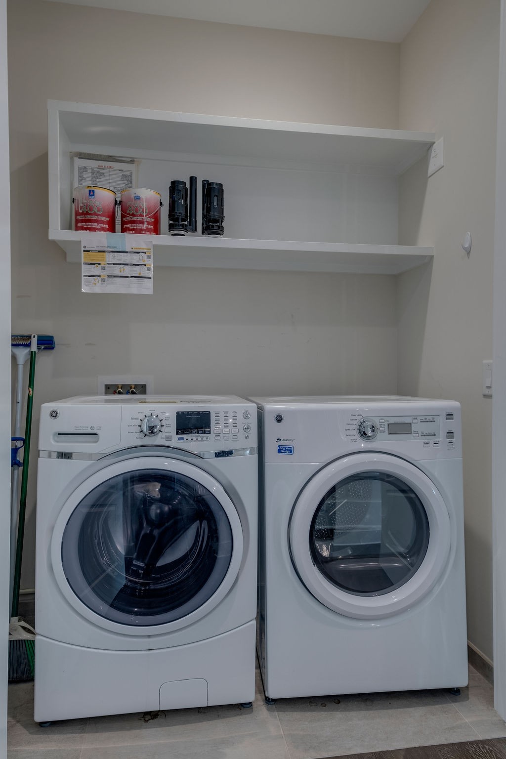 20 Rutledge Street, Unit 111 Nashville, TN 37210 - Photo 18 of 32 a utility room with dryer and washer