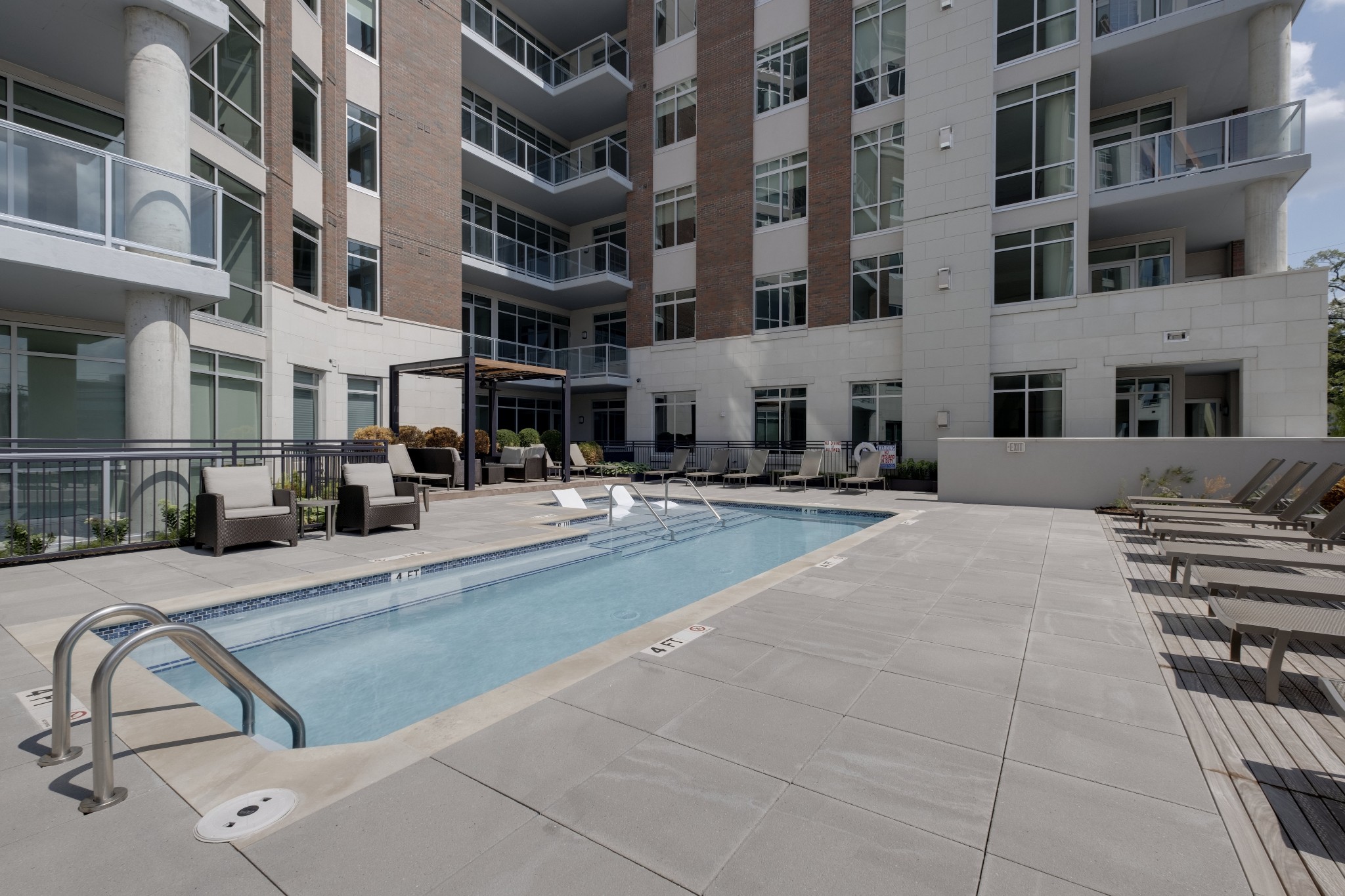 20 Rutledge Street, Unit 111 Nashville, TN 37210 - Photo 31 of 32 a view of a building with sitting area