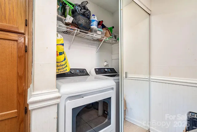a utility room with dryer and washer
