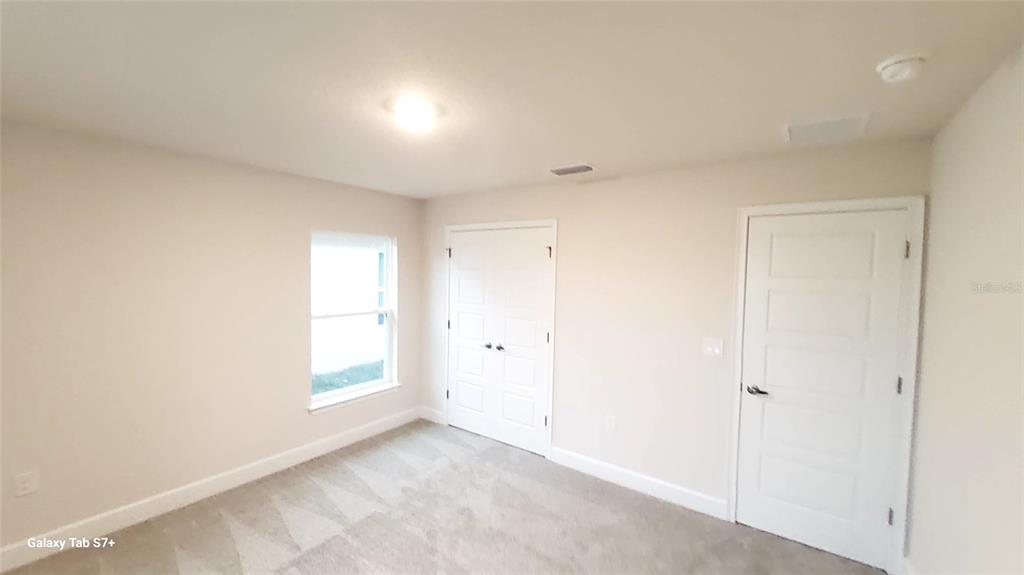 7560 Bent Tree Loop St. Cloud, FL 34773 - Photo 11 of 25 a view of an empty room