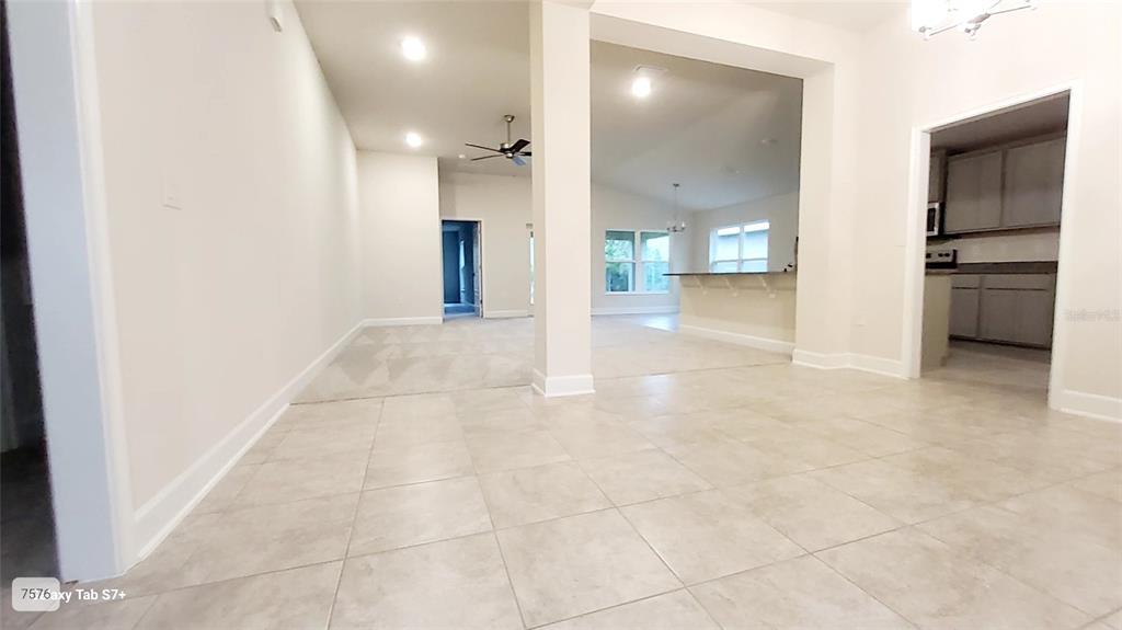 7560 Bent Tree Loop St. Cloud, FL 34773 - Photo 3 of 25 a view of a hallway