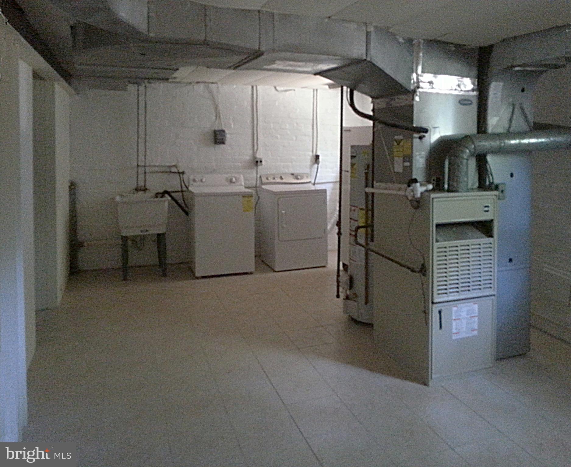 3130 38th Street Northwest Washington, DC 20016 - Photo 18 of 25 a utility room with dryer and washer