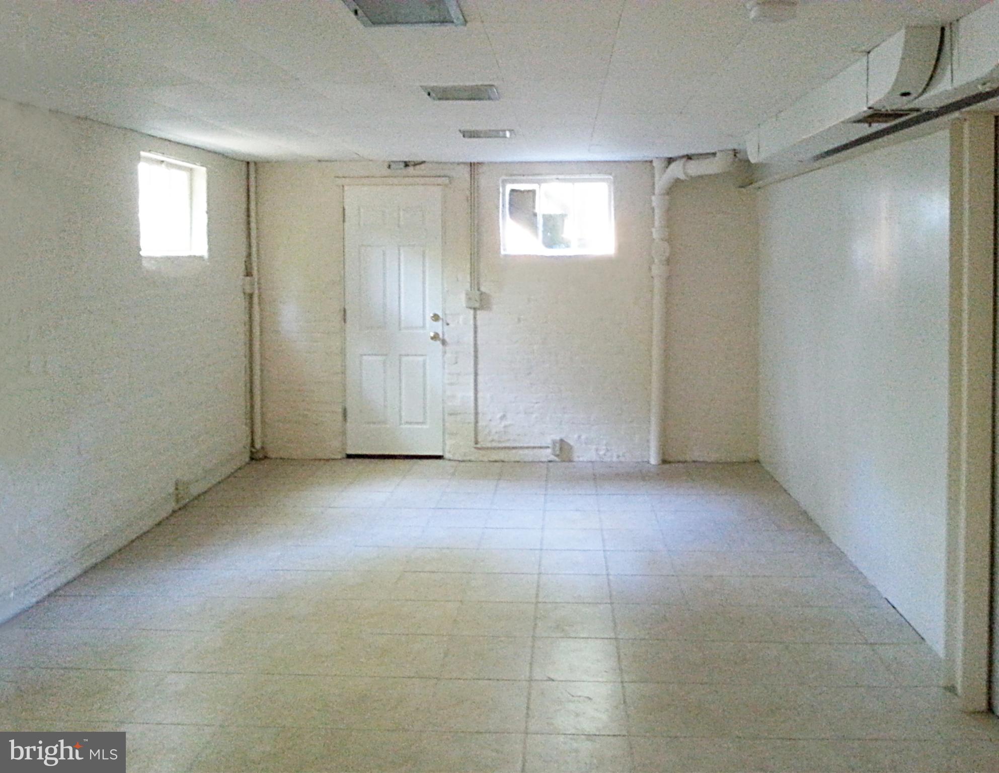 3130 38th Street Northwest Washington, DC 20016 - Photo 19 of 25 an empty room with windows and closet