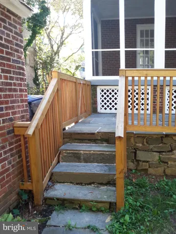 a view of entryway with a front door