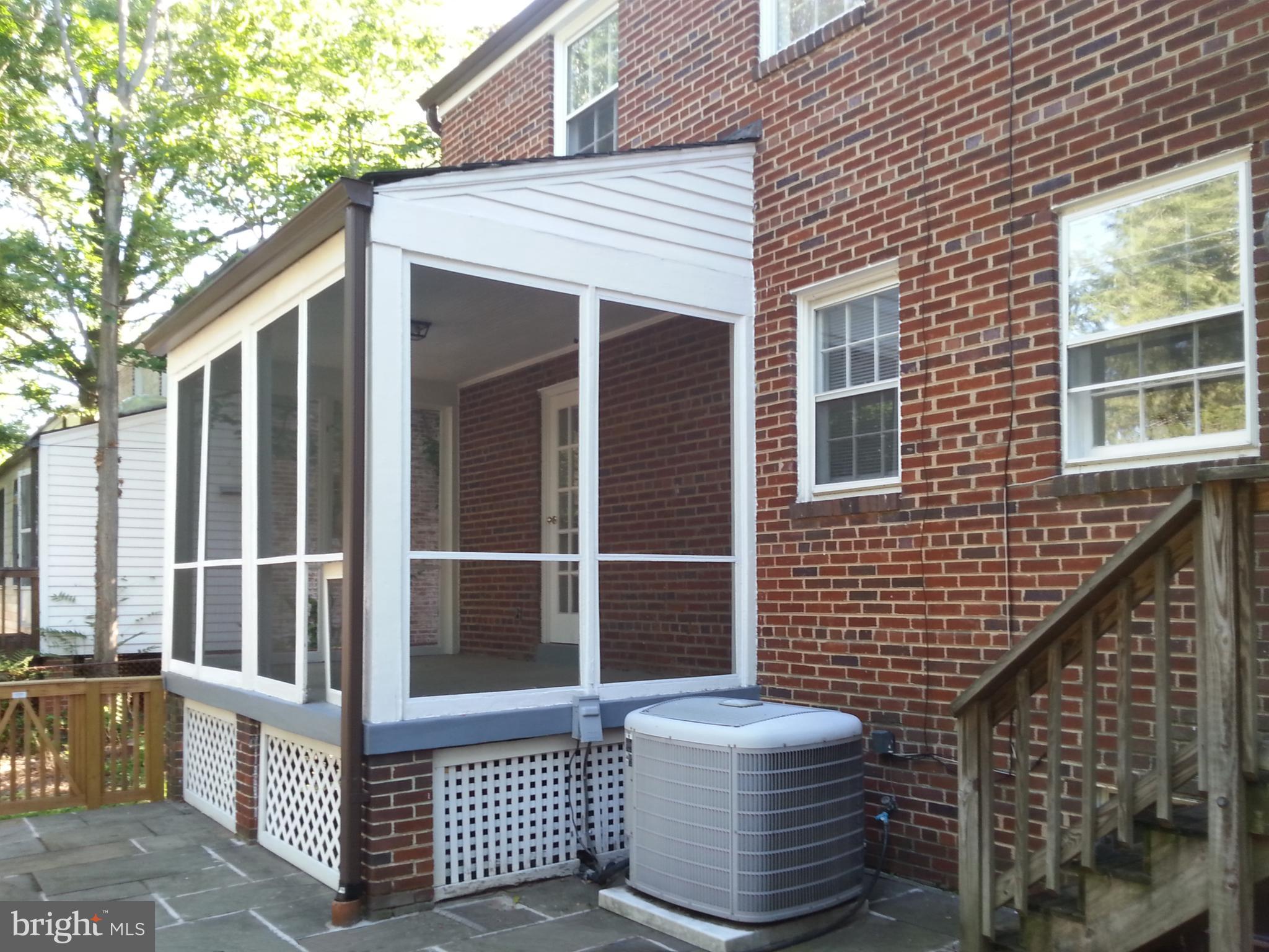 3130 38th Street Northwest Washington, DC 20016 - Photo 23 of 25 a front view of a house with glass windows