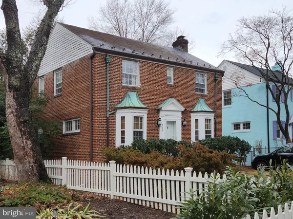 a front view of a house with a porch