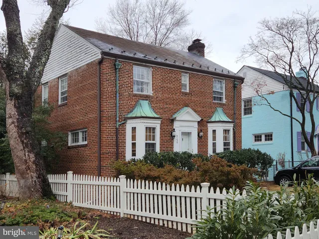 a front view of a house with a porch