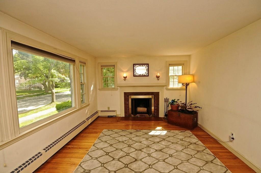 20 Westlawn Road Portland, ME 04103 - Photo 4 of 28 Sunny living room with fireplace