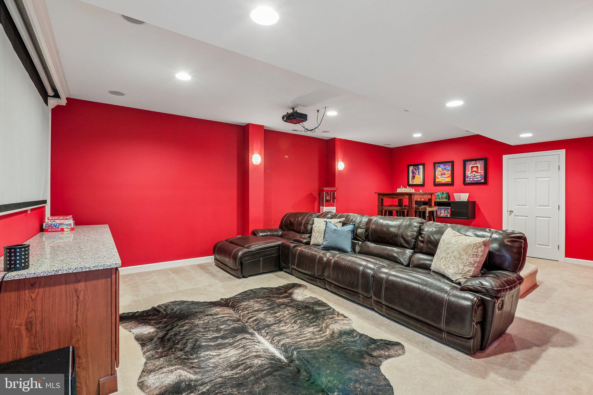 9308 Harrisons Farm Way Gaithersburg, MD 20882 - Photo 60 of 92 Media room with tiered seating.