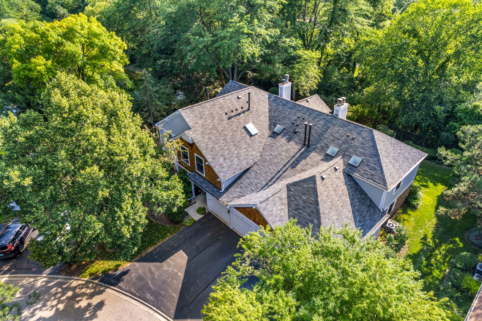 1932 Gresham Circle, Unit C Wheaton, IL 60189 - Photo 24 of 27 front view of a house with a yard