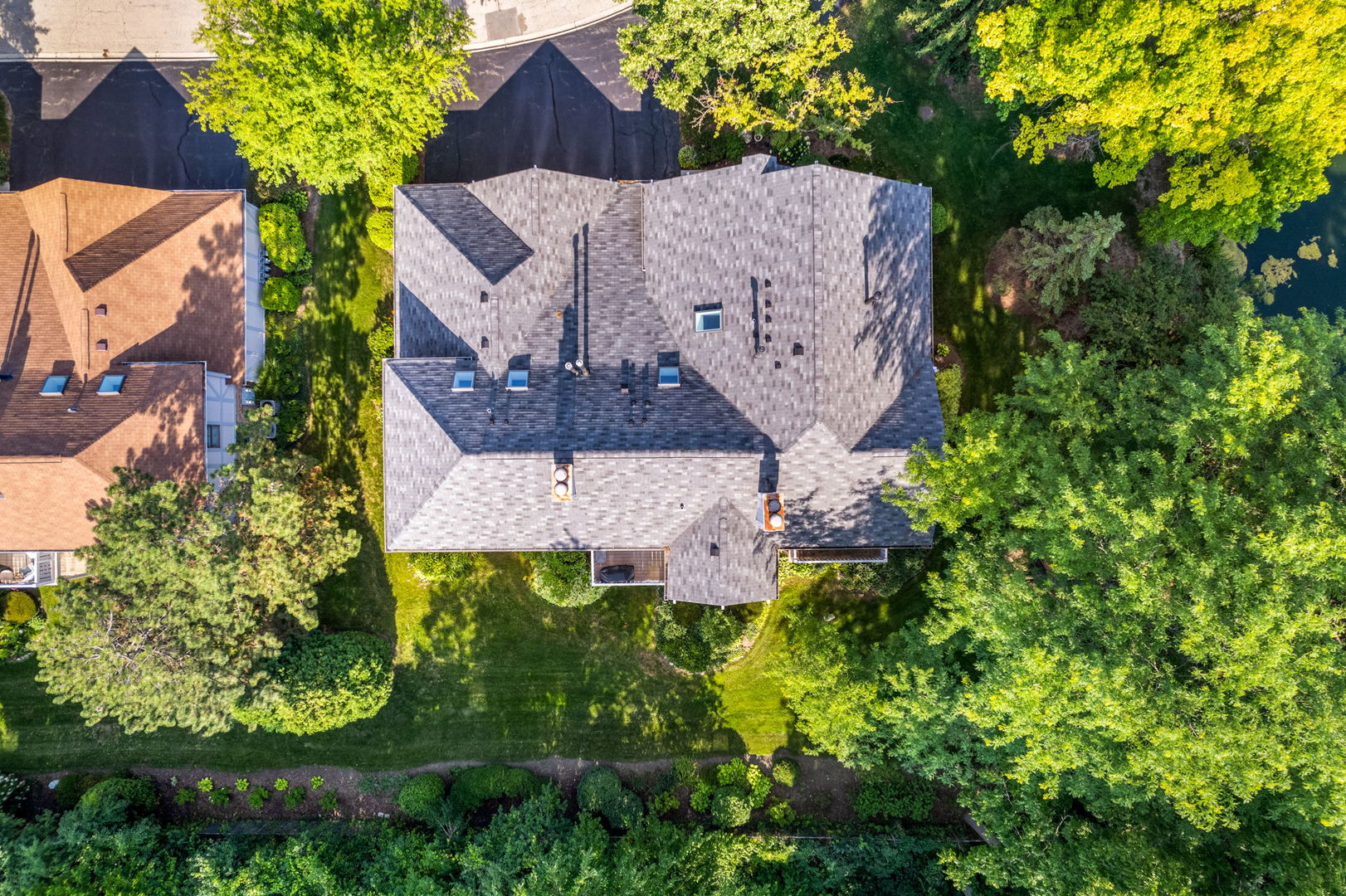 1932 Gresham Circle, Unit C Wheaton, IL 60189 - Photo 26 of 27 an aerial view of a house with garden space and street view