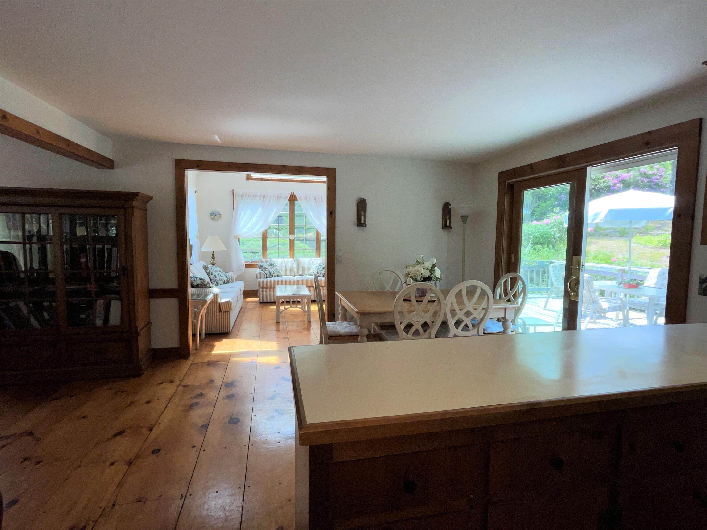 144 Long Road Harwich, MA 02645 - Photo 21 of 49 a view of a dining room with furniture window and outside view
