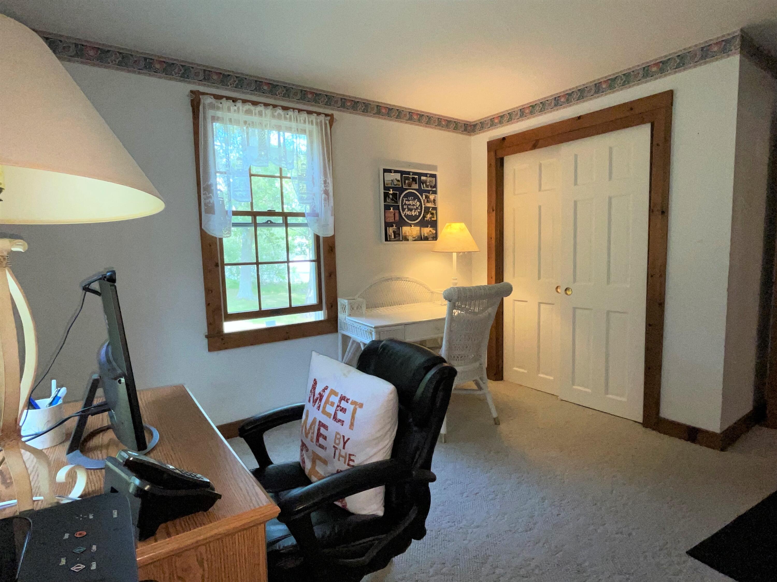 144 Long Road Harwich, MA 02645 - Photo 36 of 49 a livingroom with workspace and a window