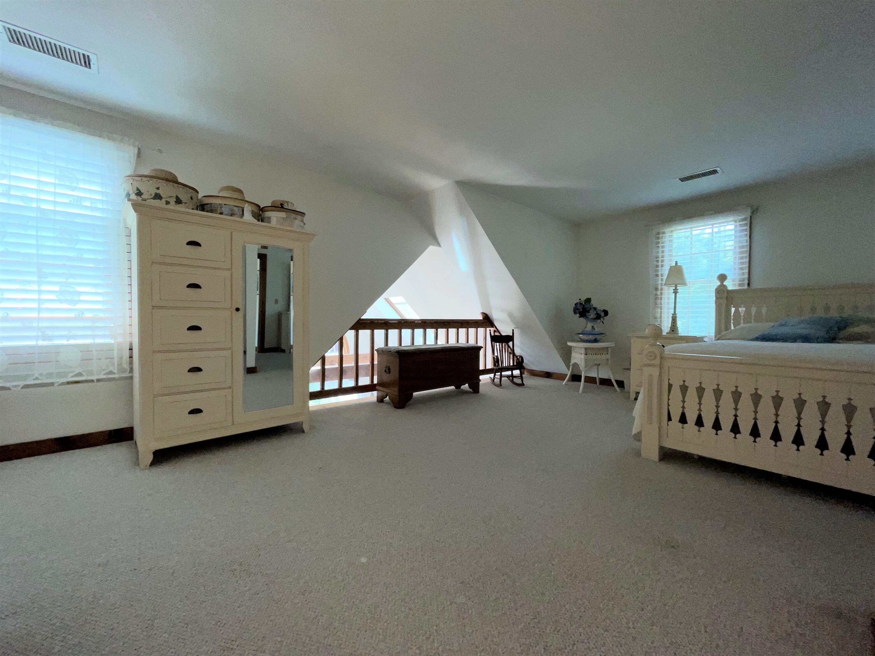 144 Long Road Harwich, MA 02645 - Photo 43 of 49 a view of a bedroom with furniture and window