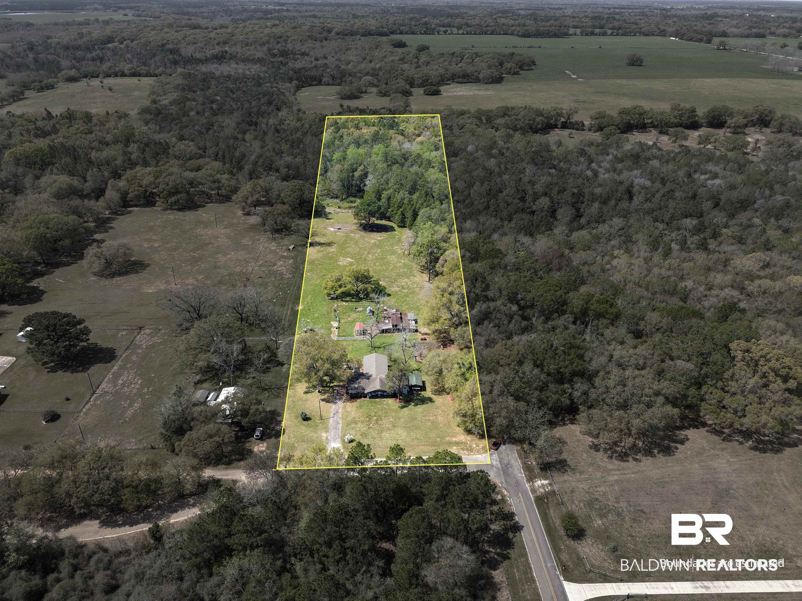 11100 Rhett McConnell Road Theodore, AL 36582 - Photo 26 of 47 Overview of rural landscape with property boundaries highlighted and a heavily wooded area