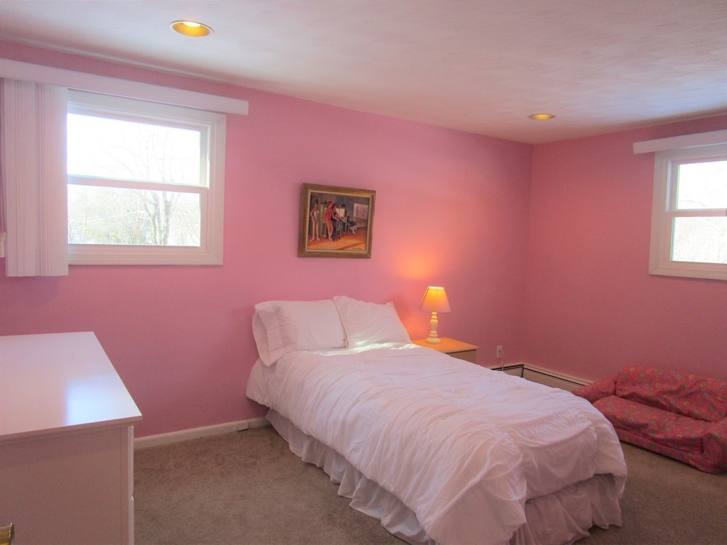 25 Lyndon Road Sharon, MA 02067 - Photo 15 of 27 a bedroom with a bed and a window