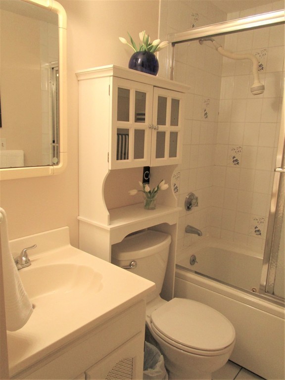 25 Lyndon Road Sharon, MA 02067 - Photo 17 of 27 a bathroom with a sink a toilet and shower