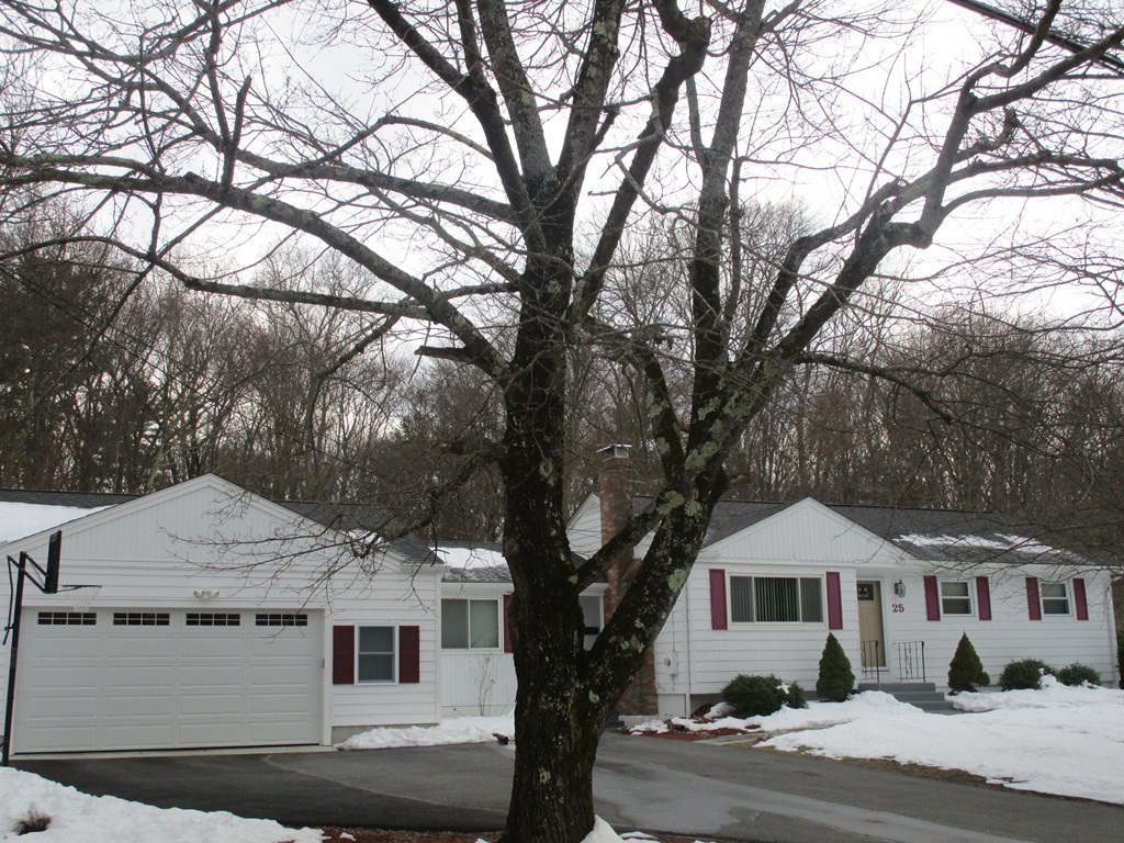 25 Lyndon Road Sharon, MA 02067 - Photo 20 of 27 a house with trees in front of it