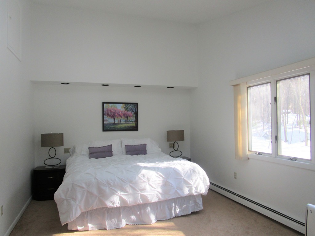 25 Lyndon Road Sharon, MA 02067 - Photo 10 of 27 a bedroom with a bed and a window